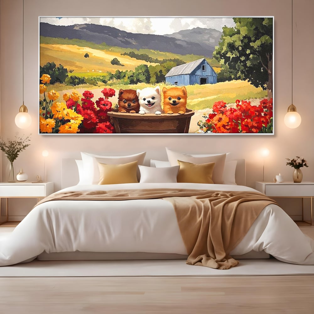 Tablou canvas cu pictura cu trei catelusi in butoi, in rama de aluminiu argintiu, pe perete intr-un dormitor